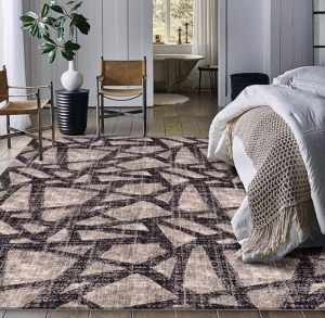 geometric area rug in bedroom | Mill Direct Floor Coverings