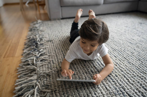 Girl lying on rug | Mill Direct Floor Coverings