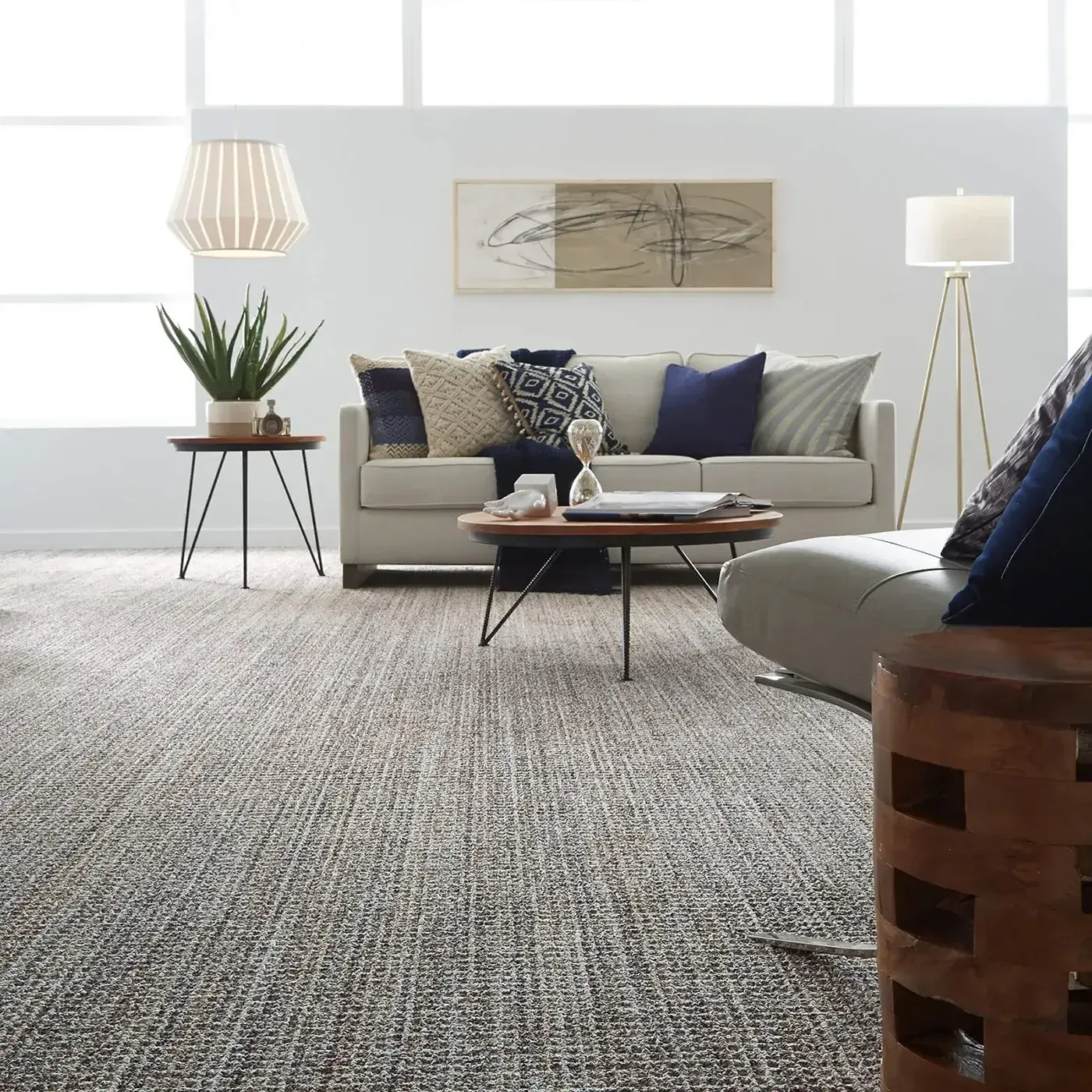 SUNDANCE-ZZ039-JURA-GREY-00525-V Textured gray Shaw Floors carpet in a modern living room