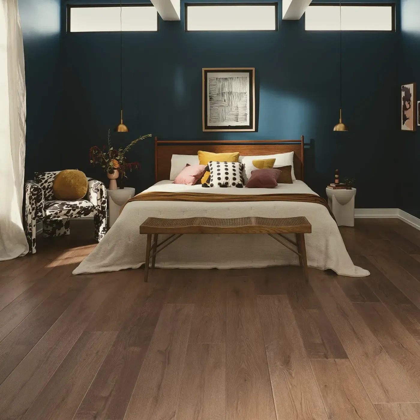 VV810_04027_ROOM COREtec Luxury Vinyl in a medium brown wood tone in a bedroom