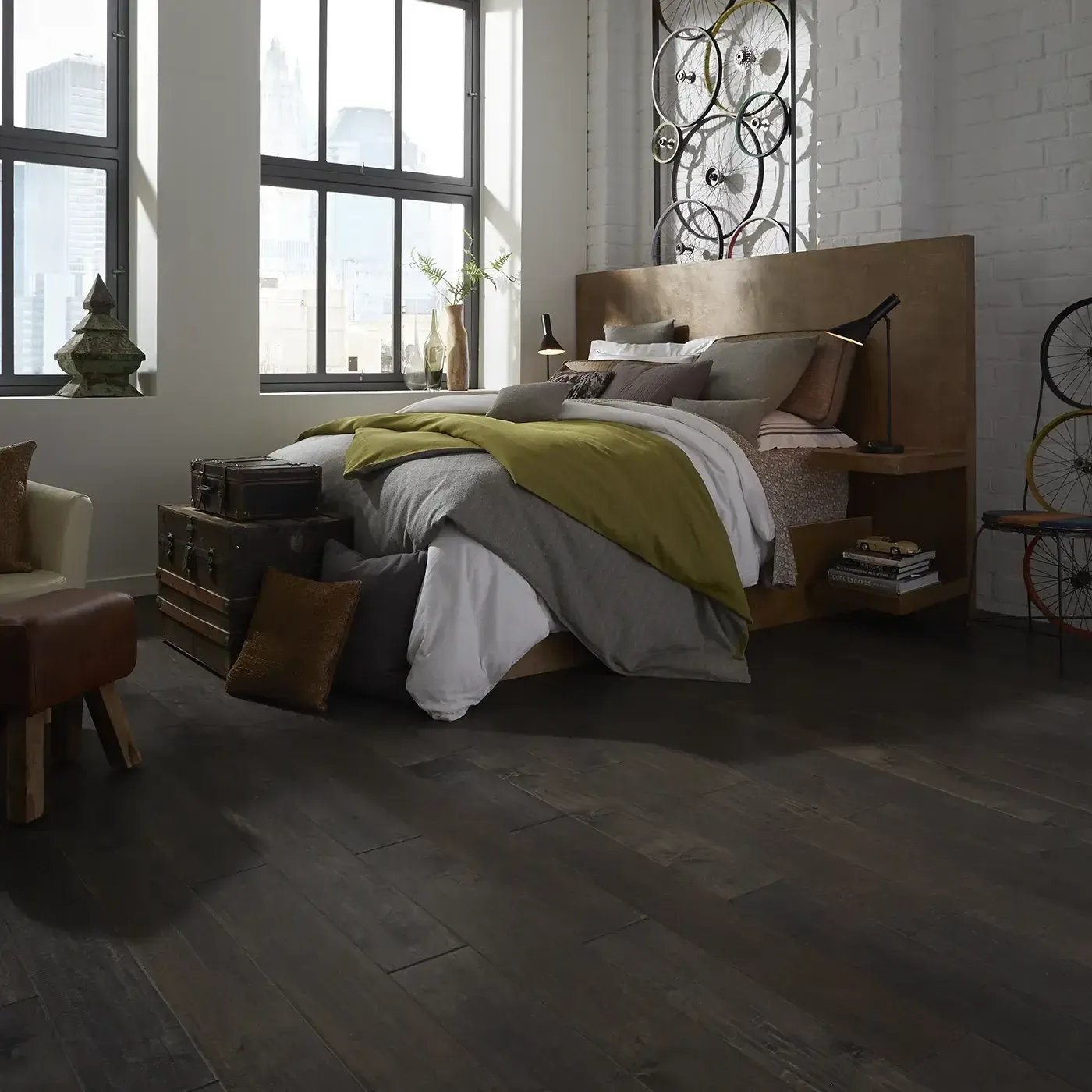 YukonMapleII-SW548-05002-Timberwolf-BedRm Dark hardwood in a modern bedroom with a large bed