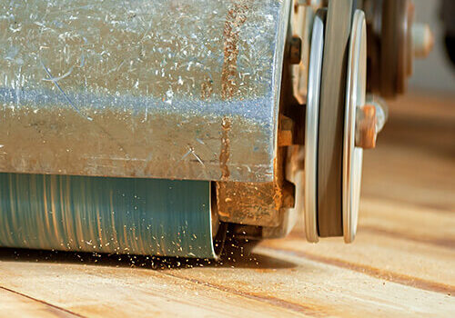 sanding down hardwood flooring | Mill Direct Floor Coverings