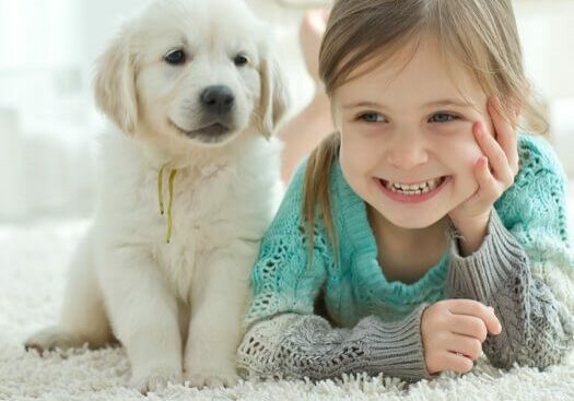 Kid and dog on carpet | Mill Direct Floor Coverings